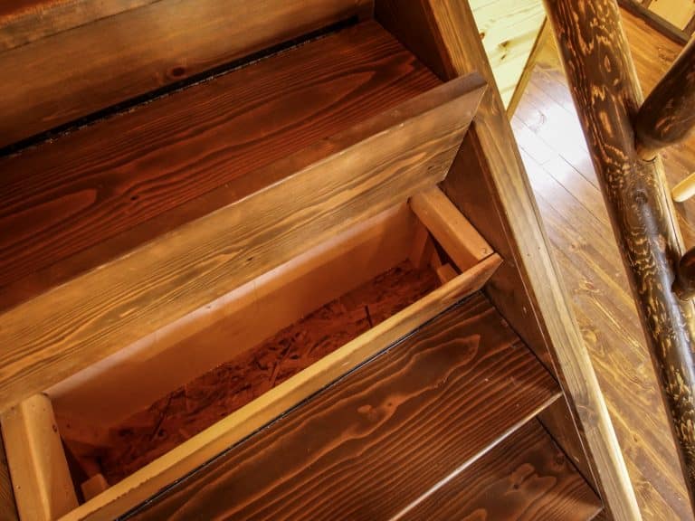 Northwoods cabin stairs with storage