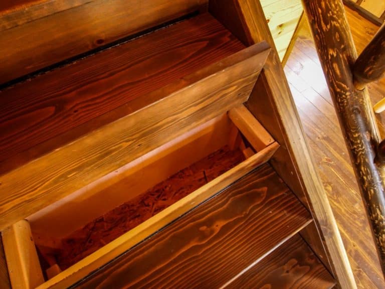 Northwoods cabin stairs with storage