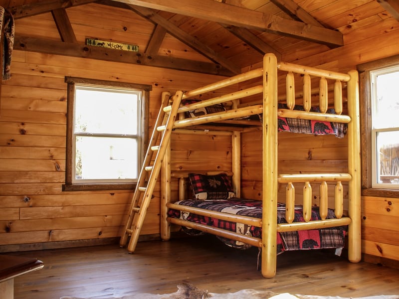 Twin bunk beds ready for sleeping the nights away in style.